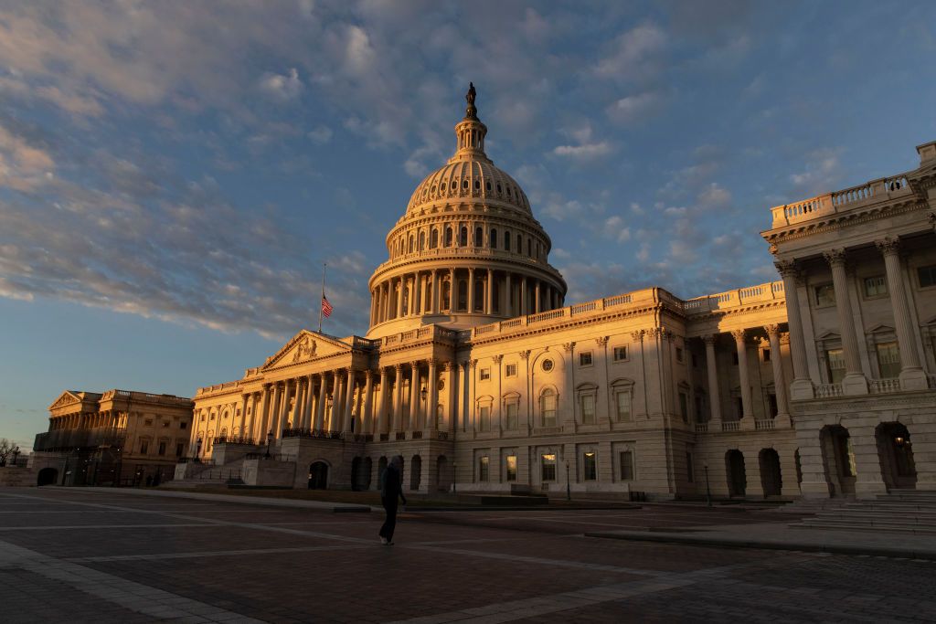 WASHINGTON, DC - DECEMBER 22: Light hits the US Capitol during sunrise on December 22, 2018 in Washington, DC. Democrats refused to agree with President Donald Trump's demands for five billion dollars to go towards building a wall on the U.S. southern border. (Photo by Alex Edelman/Getty Images)